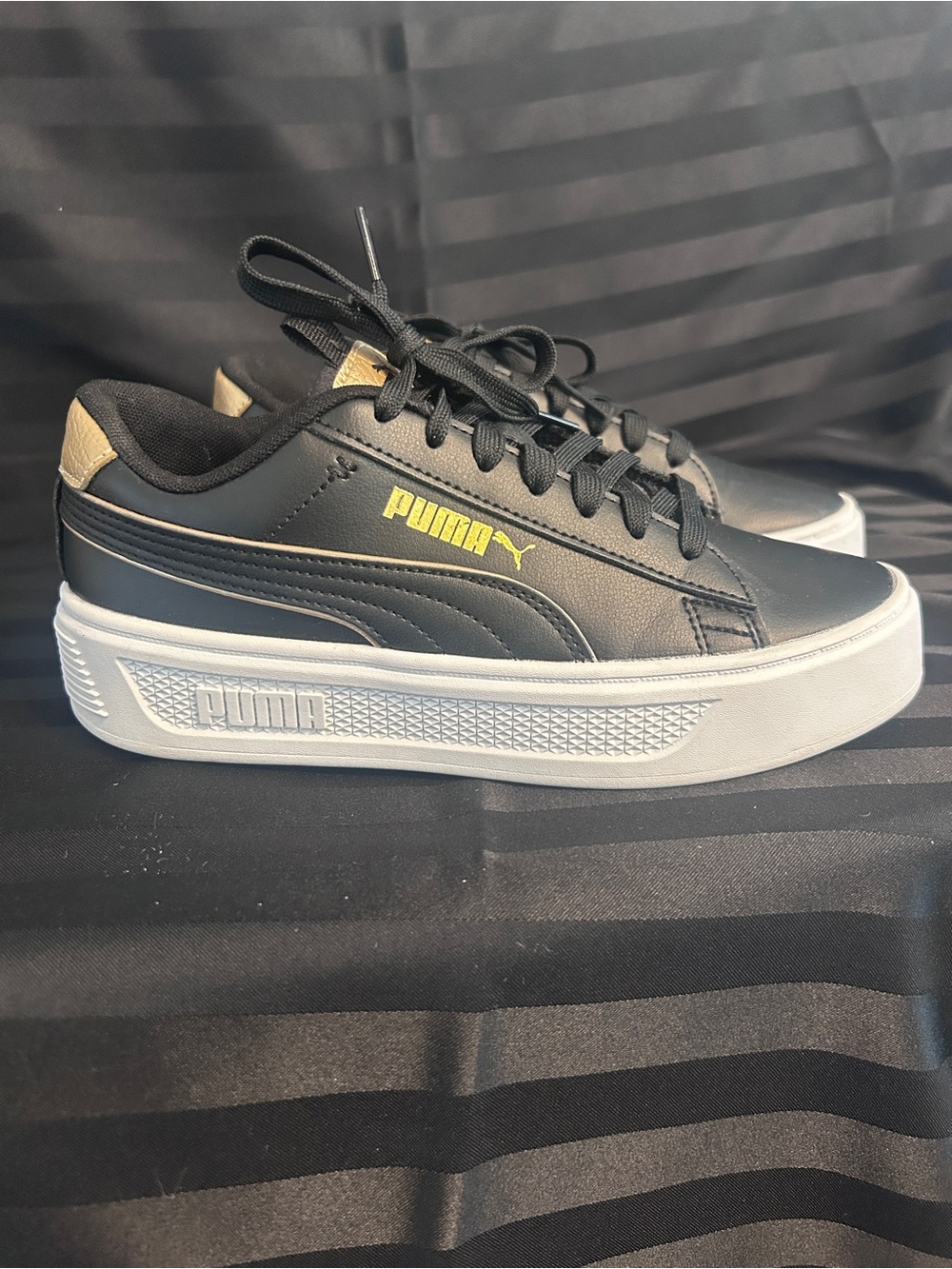 Women’s Puma Black Sneakers with Yellow Logo and White Platform